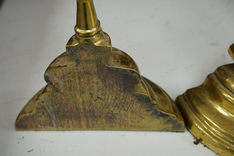 Two brass semi circular door porters, 45cm high. Condition - minor scraping to brass